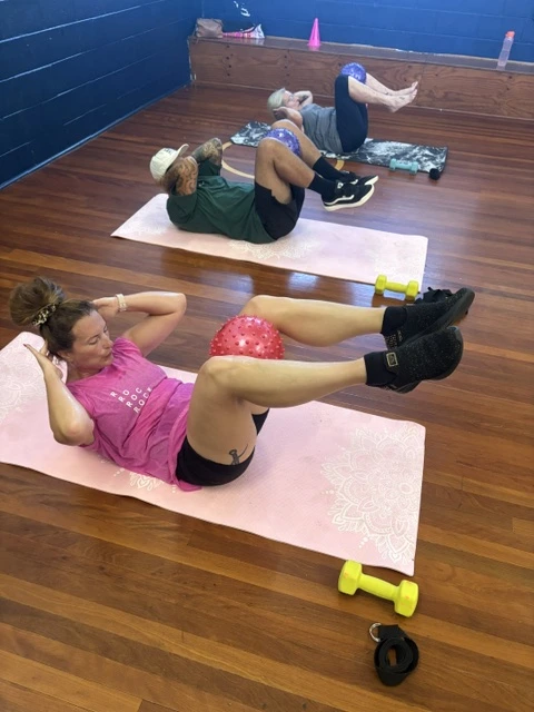 Participants training together in a Move It or Lose It small-group fitness class at Teralba Scout Hall.