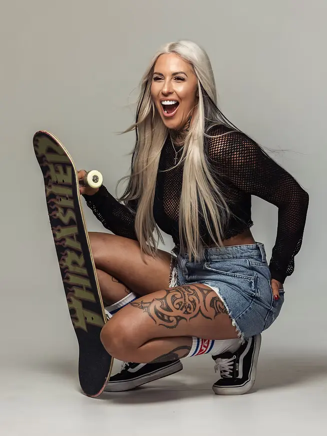 Kate Firmin skateboarding outdoors